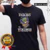 Alt Text: Original I May Live In Idaho But I'M A Minnesota Vikings Fan Forever T-Shirt design showcasing team spirit.