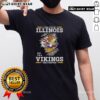 Alt Text: Original I May Live In Illinois But I'M A Minnesota Vikings Fan Forever T-Shirt design with team colors and logo.