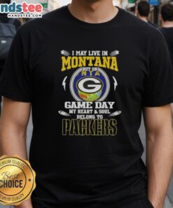 Original I May Live In Montana But On Game Day My Heart And Soul Belongs To Green Bay Packers T-Shirt displayed on a hanger.