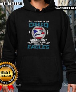 Person wearing a Philadelphia Eagles hoodie with 'I May Live In Ohio But On Game Day My Heart Belongs To Eagles' text.