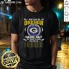 Alt Text: Original I May Live In Oregon But On Game Day My Heart And Soul Belongs To Green Bay Packers T-Shirt design.