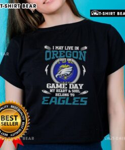 Alt Text: Ladies tee featuring 'I May Live In Oregon But On Game Day My Heart Belongs To Philadelphia Eagles' design.