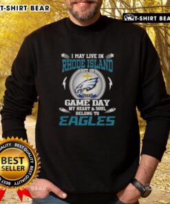 Original sweatshirt featuring 'I May Live In Rhode Island But On Game Day My Heart Belongs To Philadelphia Eagles' design.