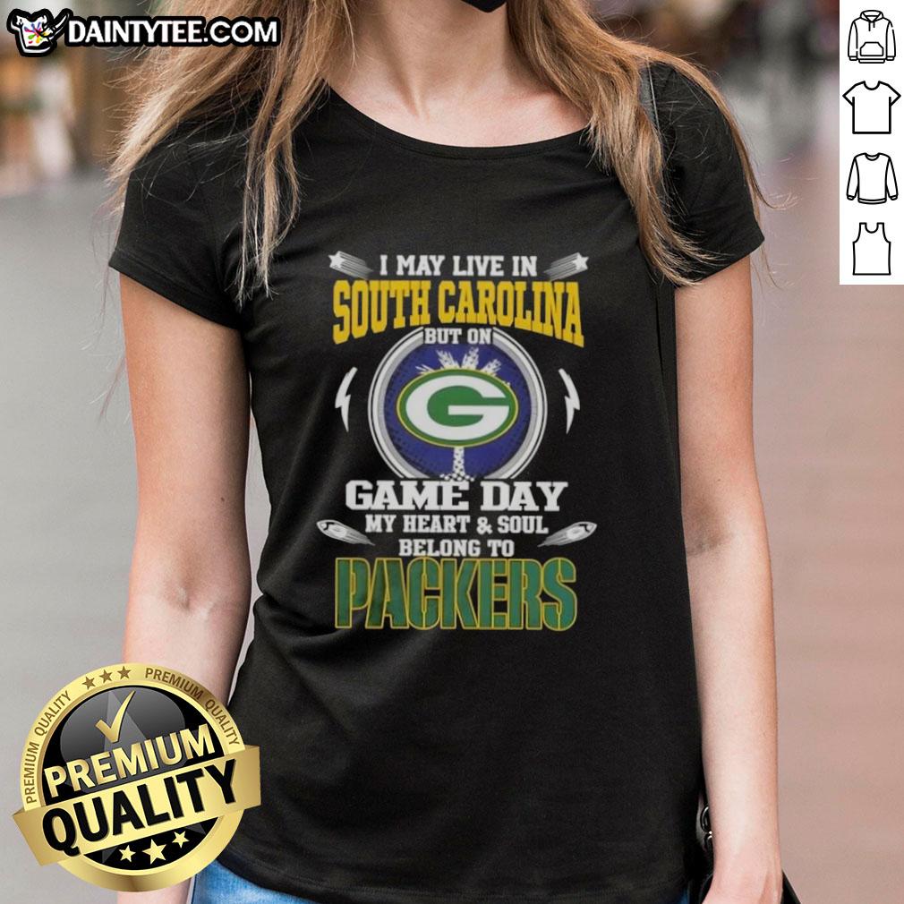 original-i-may-live-in-south-carolina-but-on-game-day-my-heart-and-soul-belongs-to-green-bay-packers-ladies-tee Green Bay Packers ladies tee with 'I may live in South Carolina, but my heart belongs to Green Bay' slogan.