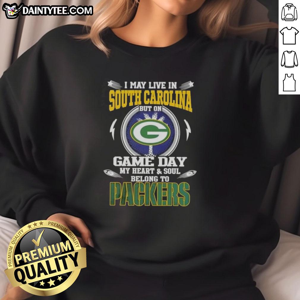 original-i-may-live-in-south-carolina-but-on-game-day-my-heart-and-soul-belongs-to-green-bay-packers-sweatshirt Alt Text: Cozy sweatshirt featuring 'I May Live In South Carolina But On Game Day My Heart Belongs To Green Bay Packers' design.