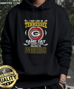 Green Bay Packers hoodie with text 'I May Live In Tennessee But On Game Day My Heart Belongs To Packers' displayed.