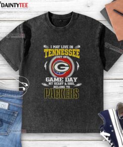 Alt Text: Green Bay Packers washed t-shirt with 'I May Live in Tennessee' slogan, perfect for game day fans.