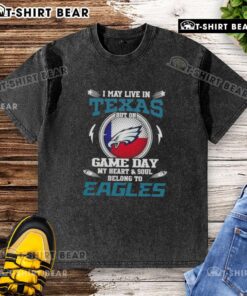 Washed t-shirt with 'I may live in Texas but on game day my heart belongs to the Philadelphia Eagles' slogan.