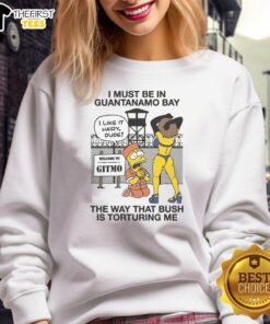 Original I Must Be In Guantanamo Bay sweatshirt featuring bold text, perfect for expressing political satire and humor.