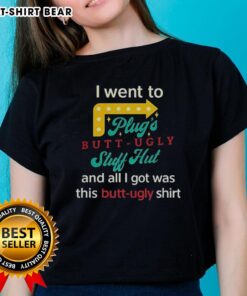 Alt Text: Original I Went To Plugs Butt Ugly Stuff Hut Ladies Tee in vibrant colors, showcasing unique graphic design.