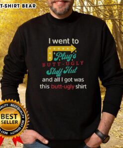 Alt Text: Cozy 'I Went To Plugs Butt Ugly Stuff Hut' sweatshirt showcasing unique design and vibrant colors, perfect for casual wear.