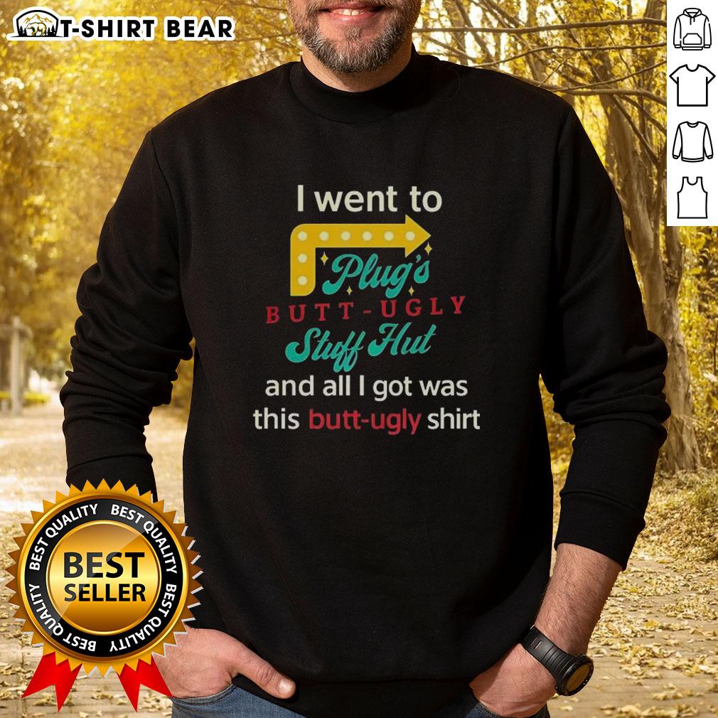 Original I Went To Plugs Butt Ugly Stuff Hut Sweatshirt Alt Text: Cozy 'I Went To Plugs Butt Ugly Stuff Hut' sweatshirt showcasing unique design and vibrant colors, perfect for casual wear.