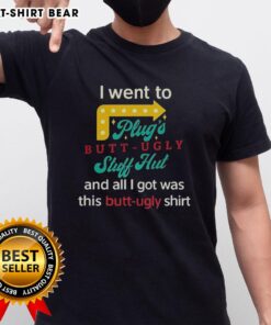 Alt Text: Original I Went To Plugs Butt Ugly Stuff Hut T-Shirt featuring a fun, quirky design perfect for casual wear.