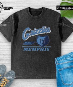 Alt Text: Vintage washed Memphis Grizzlies Fly By t-shirt featuring a classic logo design in relaxed fit for fans.