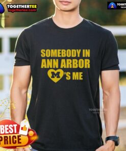 Alt Text: Original Michigan Somebody In Ann Arbor Loves Me T-Shirt featuring vibrant graphics and comfortable fabric design.