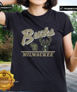 Original Milwaukee Bucks Fly By vintage ladies tee in green with classic logo design, perfect for basketball fans.