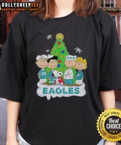 Alt Text: Original Peanuts characters on a Philadelphia Eagles Christmas ladies tee, perfect for holiday football fans.