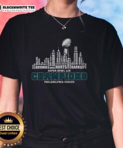 Original Philadelphia Eagles Champions 2025 Super Bowl LIX skyline design on a women's tee shirt.