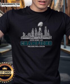 Alt Text: Original Philadelphia Eagles 2025 Super Bowl LIX skyline t-shirt featuring city name and champions design.