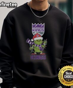 Original Sacramento Kings Christmas Grinch Santa Hat Holiday 2025 Sweatshirt featuring festive design and team logo.