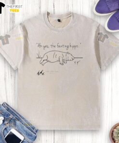 Alt Text: Original Tanganyika Wildlife Park Fainting Hippo T-shirt featuring a playful design of a hippo in a whimsical pose.