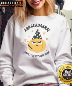 Cozy Premium Abracadabra Nope You're Still Here Pumpkin Sweatshirt in vibrant orange, perfect for fall fashion and Halloween.