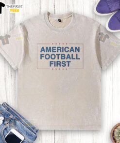 Premium American Football First Logo Washed T-Shirt featuring a vintage design, perfect for fans and casual wear.
