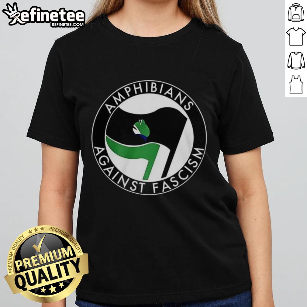 premium-amphibians-against-fascism-frog-flag-ladies-tee Premium Amphibians Against Fascism Frog Flag Ladies Tee showcasing a vibrant frog graphic on a stylish shirt.