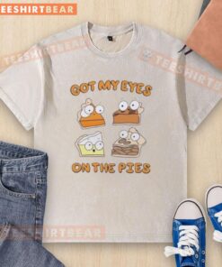 Premium cartoon pumpkin pie, pecan pie, lemon meringue pie, and apple pie design on a washed T-shirt.