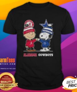 Alt Text: Premium Charlie Brown and Snoopy Alabama Crimson Tide x Dallas Cowboys T-Shirt featuring iconic characters in team colors.