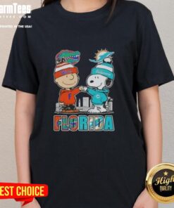 Premium Charlie Brown and Snoopy Florida Gators Miami Dolphins skyline ladies tee featuring vibrant graphics and comfy fit.