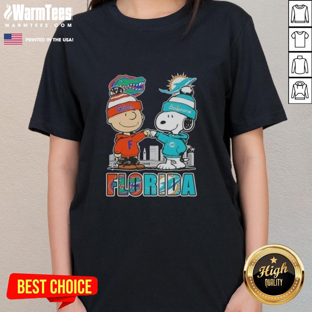 premium-charlie-brown-and-snoopy-florida-gators-and-miami-dolphins-skyline-ladies-tee Premium Charlie Brown and Snoopy Florida Gators Miami Dolphins skyline ladies tee featuring vibrant graphics and comfy fit.