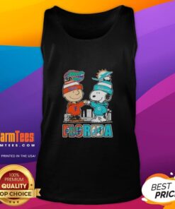 Premium Charlie Brown and Snoopy Florida Gators Miami Dolphins skyline tank top for sports fans and collectors.