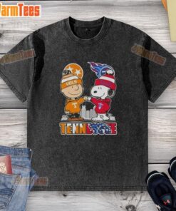 Alt Text: Premium Charlie Brown and Snoopy Tennessee Vols x Titans skyline washed t-shirt featuring vibrant graphics and comfortable fit.