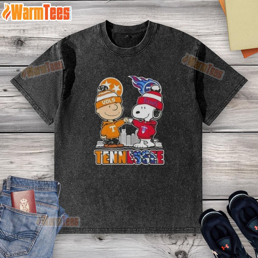 premium-charlie-brown-and-snoopy-tennessee-vols-x-titans-skyline-washed-t-shirt Alt Text: Premium Charlie Brown and Snoopy Tennessee Vols x Titans skyline washed t-shirt featuring vibrant graphics and comfortable fit.