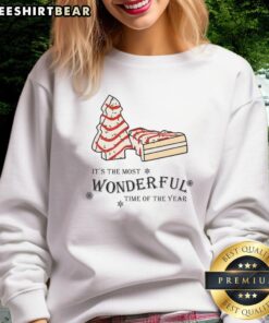 Alt Text: Cozy sweatshirt featuring a festive Christmas tree cake design, perfect for celebrating the most wonderful time of the year.