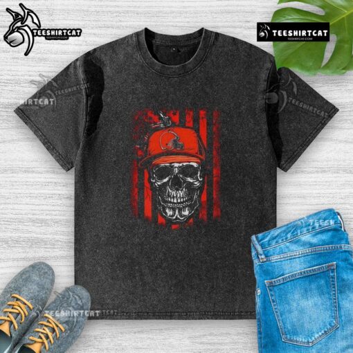 Alt Text: Premium Cleveland Browns NFL Skull American Flag T-Shirt for football lovers, featuring a washed vintage look.