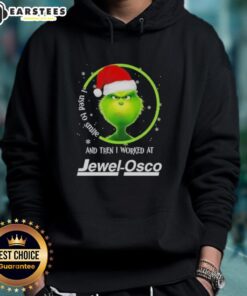 Premium Grinch Christmas hoodie featuring 'I Used to Smile and Then I Worked at Jewel-Osco' design for festive humor.
