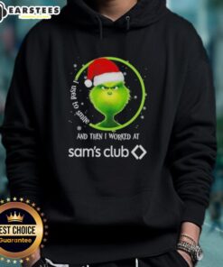 Premium Grinch Christmas hoodie featuring 'I Used to Smile and Then I Worked at Sam's Club' design for festive holiday cheer.