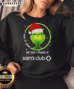 Alt Text: Premium Grinch Christmas sweatshirt featuring I Used To Smile And Then I Worked At Sam's Club design for festive humor.