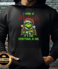 Premium Grinch Christmas Tree hoodie from Michaels featuring 'I Work At It's Fine Everything Is Fine' design.