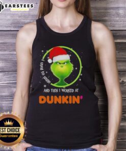 Premium Grinch tank top with 'I Used To Smile And Then I Worked At Dunkin Donuts' print, perfect for coffee lovers.