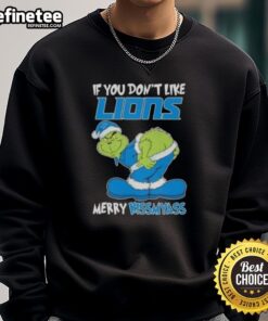 Premium Grinch sweatshirt with 'If You Don't Like Detroit Lions, Merry Kiss My Ass' design, perfect for football fans.