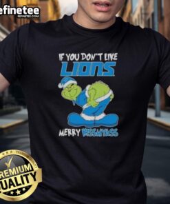 Premium Grinch 'If You Don't Like Detroit Lions, Merry Kissmyass' T-Shirt featuring a playful Grinch design.
