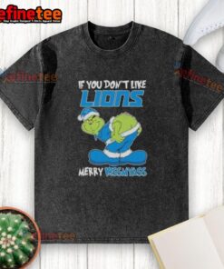 Premium Grinch 'If You Don't Like Detroit Lions, Merry Kiss My Ass' washed t-shirt for passionate NFL fans.