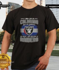 Premium t-shirt featuring 'I May Live In Colorado But On Gameday My Heart And Soul Belongs To Raiders' design.