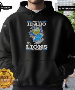 Alt Text: Premium hoodie for Lions fans: 'I May Live In Idaho But I'm A Lions Fan Forever' showcasing team pride.
