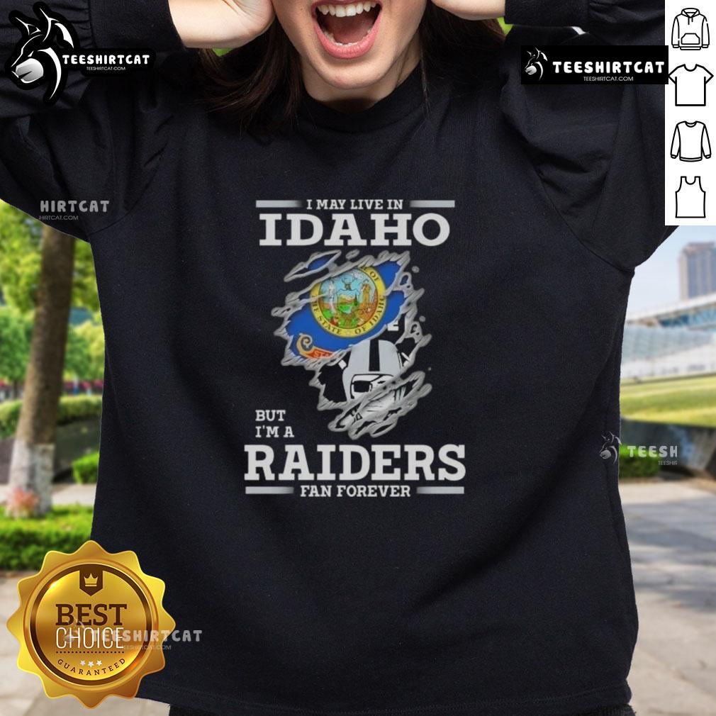 Premium I May Live In Idaho But I'M A Raiders Fan Forever Sweatshirt Alt Text: Premium sweatshirt featuring 'I May Live In Idaho But I'm A Raiders Fan Forever' design for NFL fans.