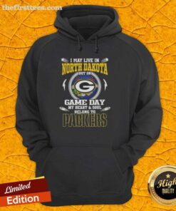 Alt Text: Green Bay Packers hoodie with 'I may live in North Dakota but on game day my heart belongs to Packers' design.