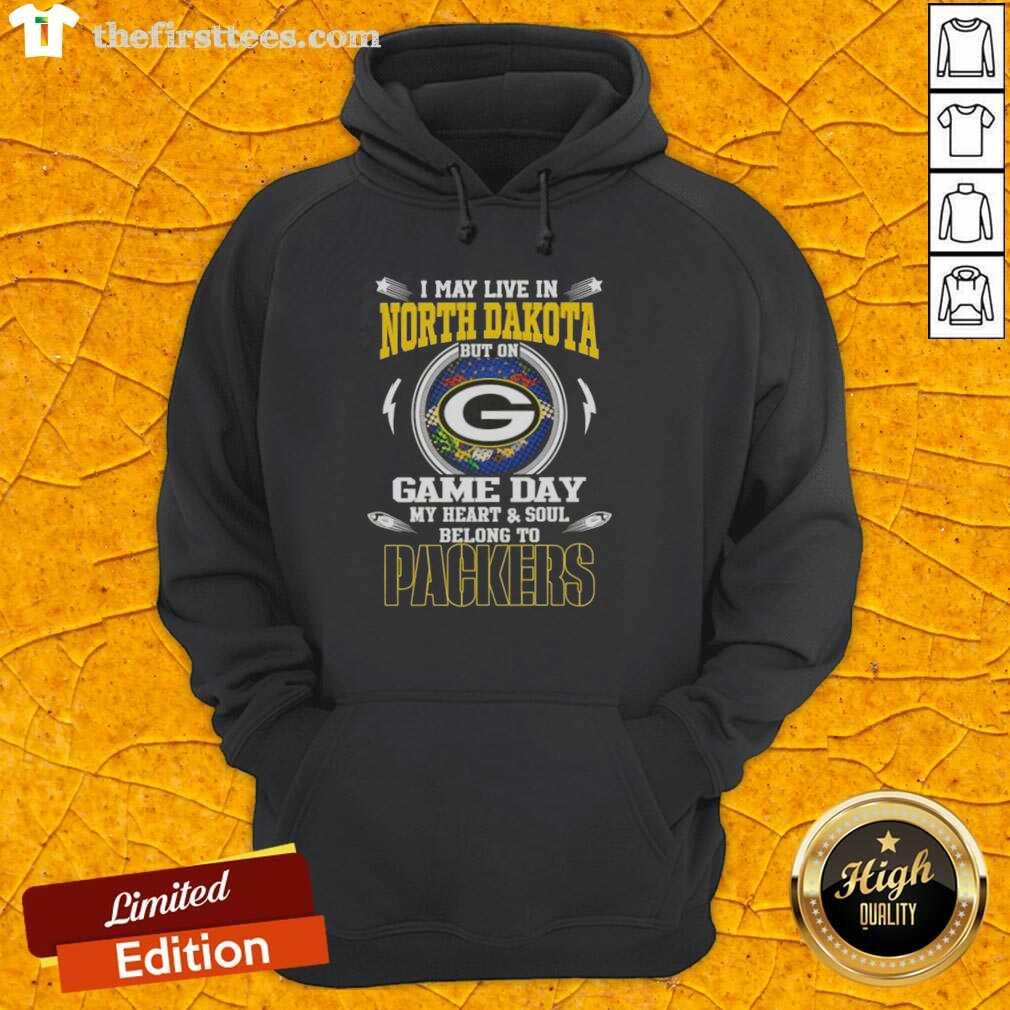premium-i-may-live-in-north-dakota-but-on-game-day-my-heart-and-soul-belongs-to-green-bay-packers-hoodie Alt Text: Green Bay Packers hoodie with 'I may live in North Dakota but on game day my heart belongs to Packers' design.
